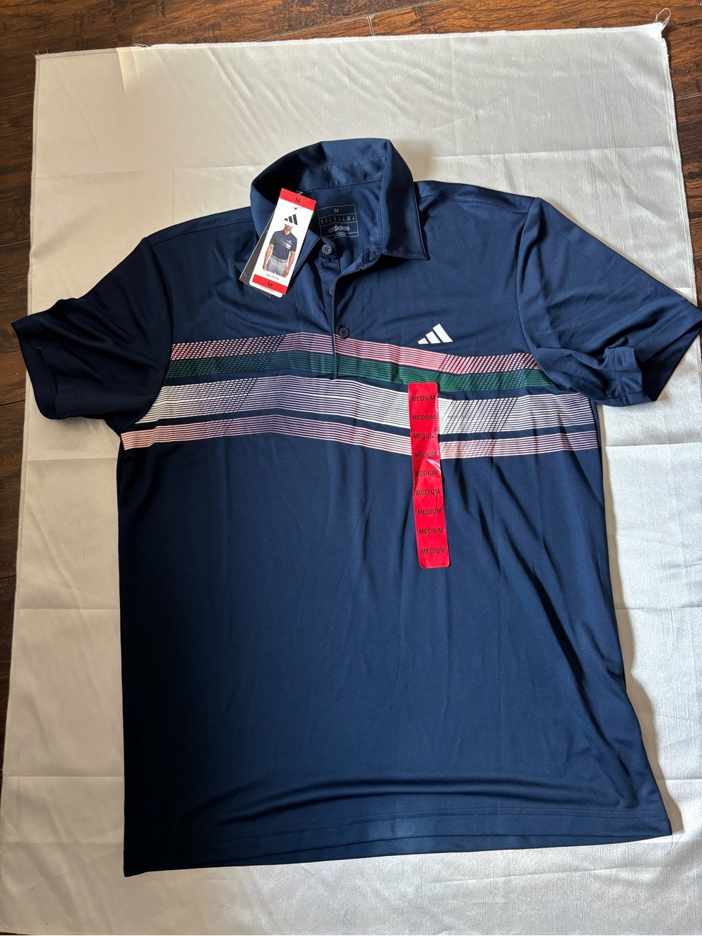 adidas Navy Polo with Pink and Green Chest Stripes